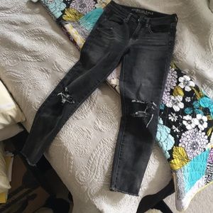 Distressed black jeans